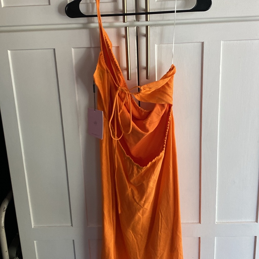 Brand new with tag LX strappy below the knee dress